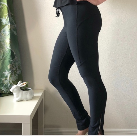 nike dri fit running leggings with zipper ankle
